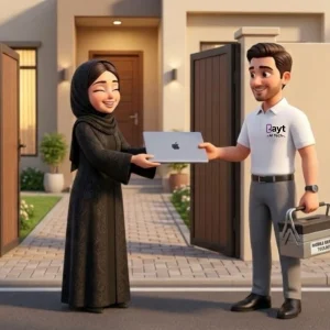 Customer receiving their device after professional MacBook screen replacement in Qatar at Bayt Al Tech service center.